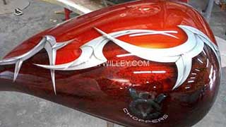 V8 Chopper motorcycle orange and brick with grahpics by Wet Willey