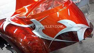 V8 Chopper motorcycle orange and brick with grahpics by Wet Willey